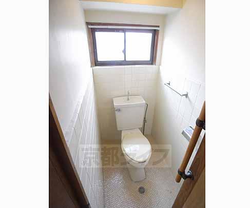 Toilet. Western-style toilet, It is with window