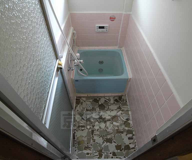 Bath. It is a simple bathroom.