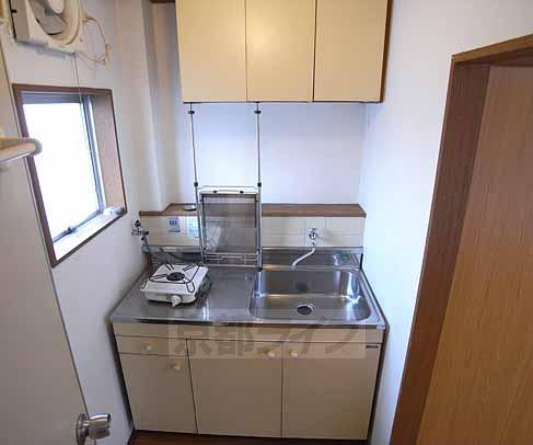 Kitchen. It is bright and there is a window in the kitchen