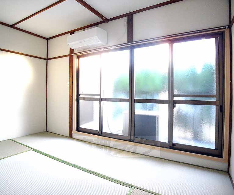 Living and room. Large windows is characteristic.