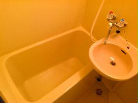 Bath. Unit is a bus of the room.