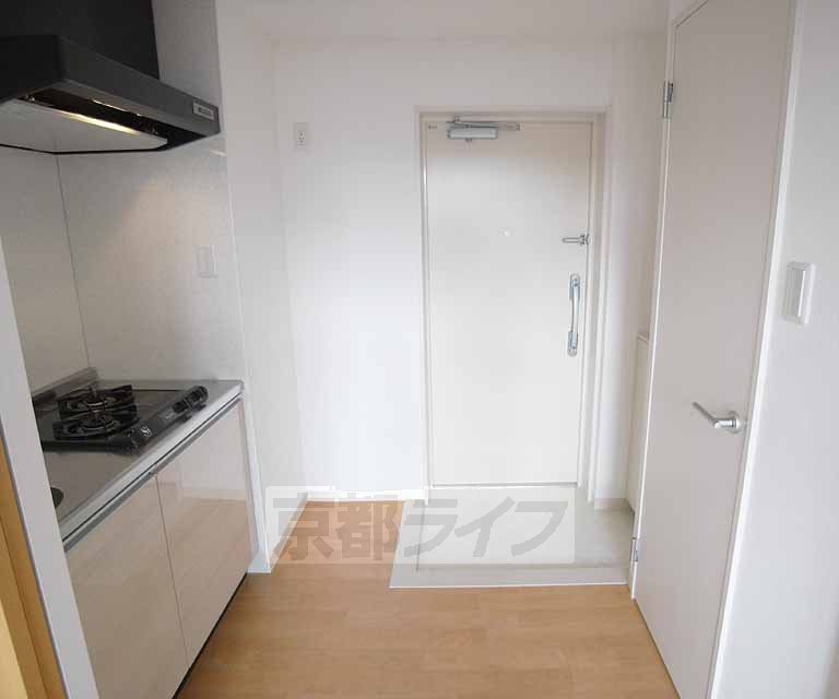 Living and room. Also spacious around the kitchen.