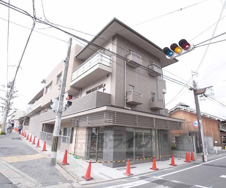 Building appearance. It stood on the corner lot.