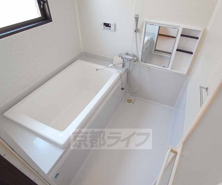 Bath. Feet stretch likely bathtub