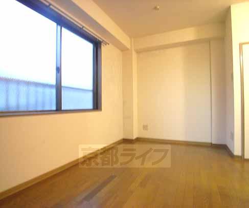 Living and room. Large is with window of the room.