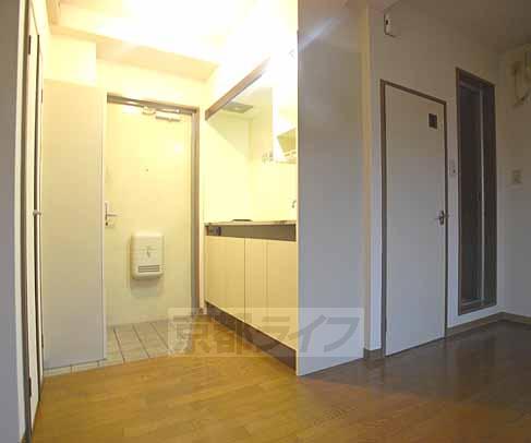 Living and room. Is the entrance and kitchen.