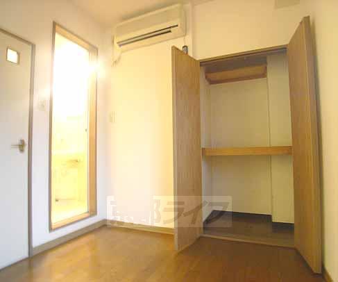 Living and room. It is housed in a large closet.