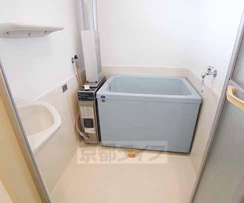 Bath. It is a big bath in the light blue of the bathtub.