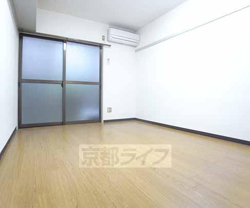 Living and room. It is quite wide