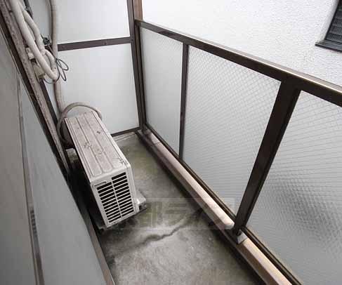 Balcony. It is the outdoor unit.