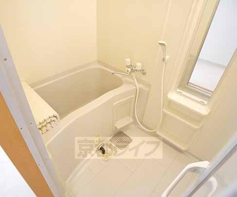 Bath. It is a bath with shower.