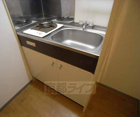 Kitchen. Gas stove is equipped with.