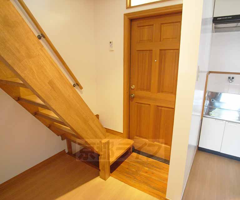 Entrance. There are stairs to the loft at the entrance side.