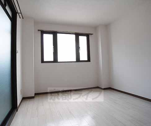 Living and room. Corner room is with window of the room.