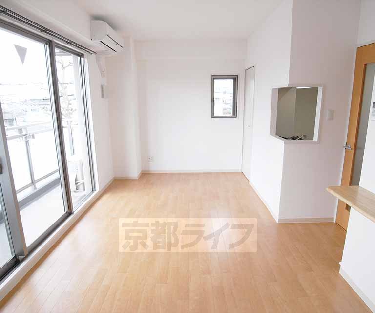 Living and room. Large windows is impressive.