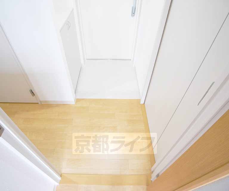 Living and room. It is around the entrance.