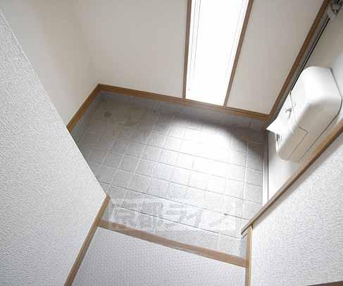 Entrance. Porch light of day is coming.