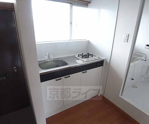 Kitchen. It is a compact kitchen.