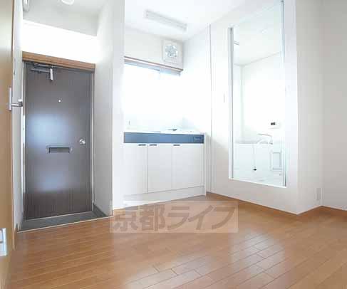 Living and room. It is 2 Pledge of kitchen.