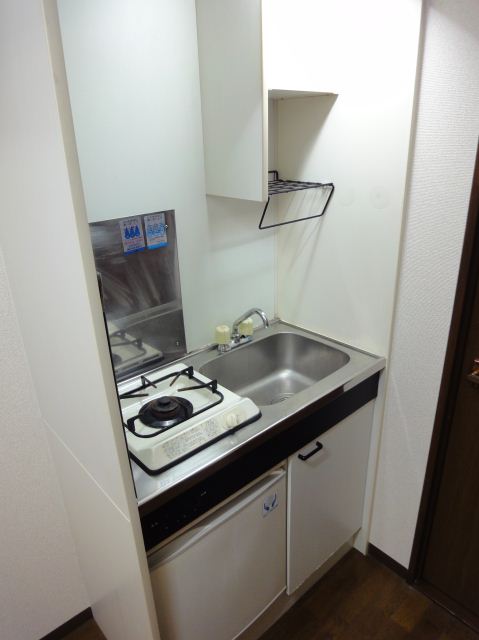 Kitchen. Gas stove, Fridge