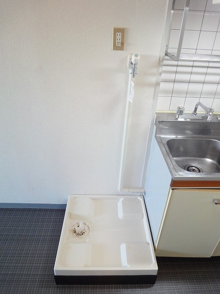 Other Equipment. Washing machine in the room