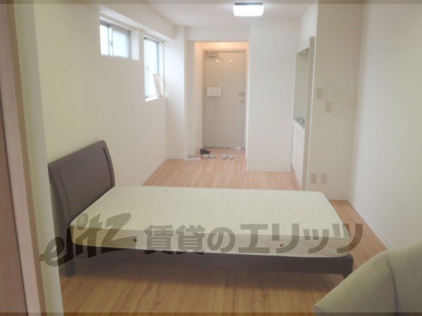 Living and room. Also it comes with a bed