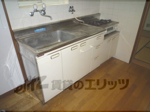Kitchen. It is a photograph of the 104 in Room.