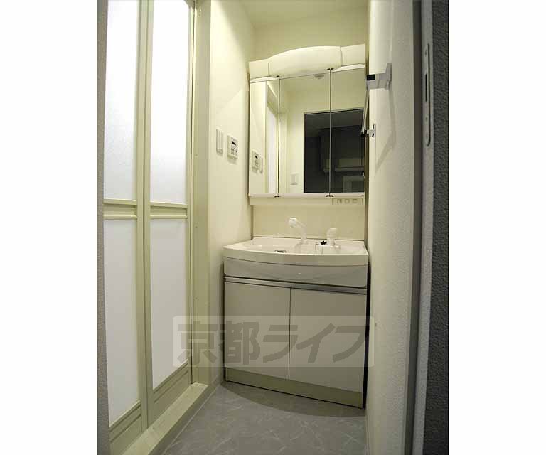 Washroom. With separate wash basin.