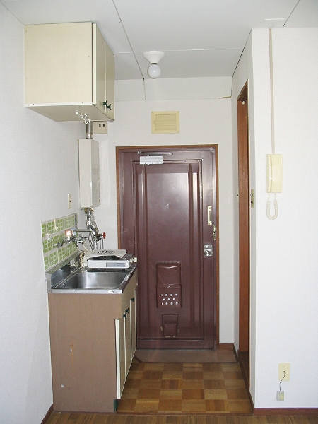 Entrance. There is a kitchen and immediately entered the front door.