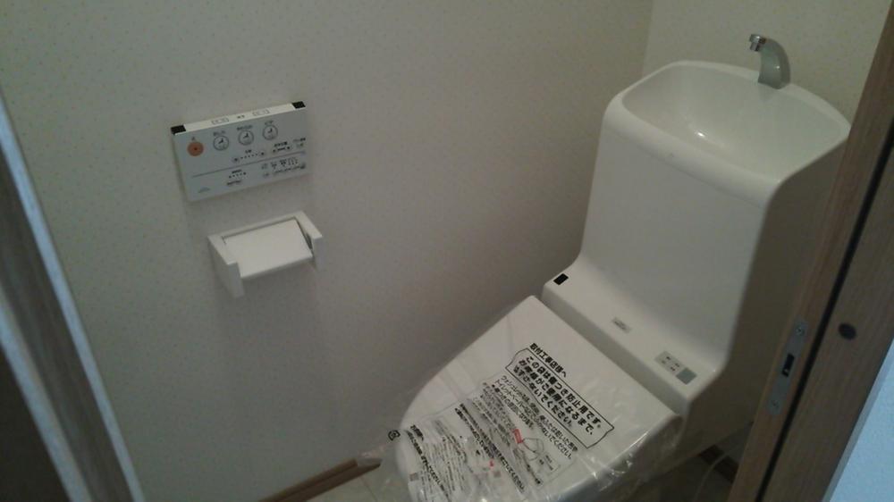 Other Equipment. TOTO of hand washing is integral bidet with a toilet bowl. 