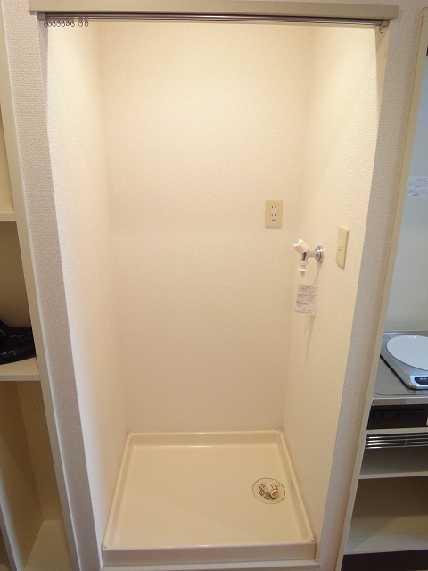 Other Equipment. Washing machine in the room (is a photograph of the same type by Room No.)