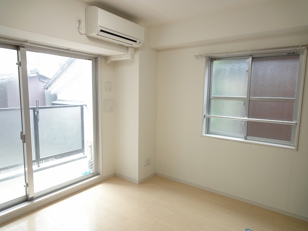 Living and room. There is a small window.