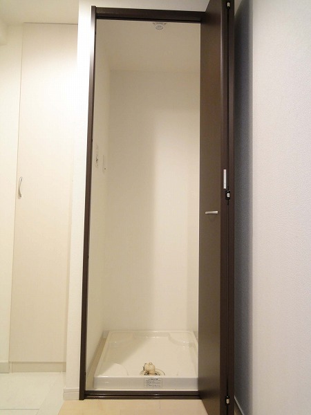 Other Equipment. There is a washing machine yard in the room.