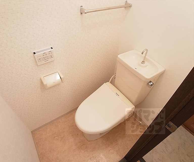 Toilet. It is heating with warm water washing toilet seat equipped with toilet.