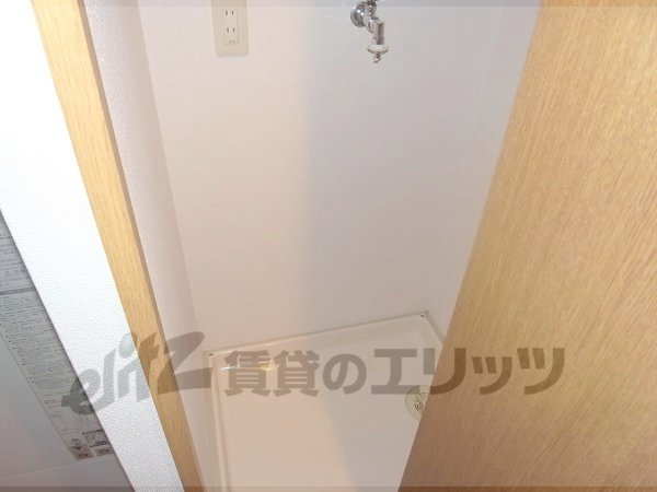 Other Equipment. There is space for a washing machine in a room.