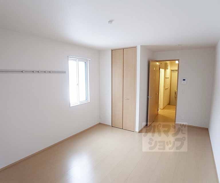 Living and room. Corner room is marked with a window on the side