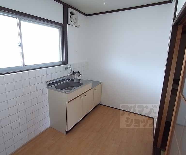 Living and room. Effortlessly ventilation attaching a window in the kitchen.