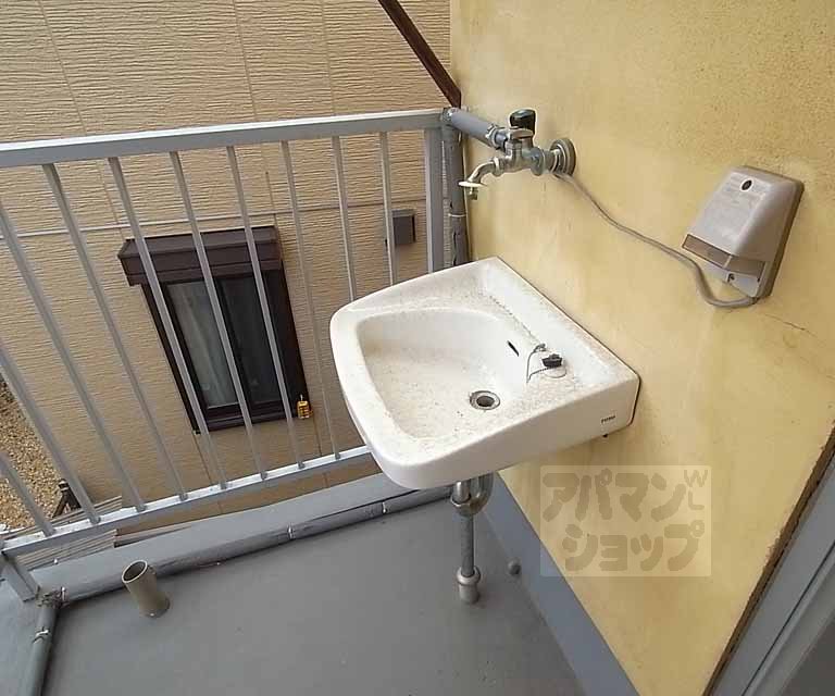 Washroom. Also it comes with a separate wash basin.