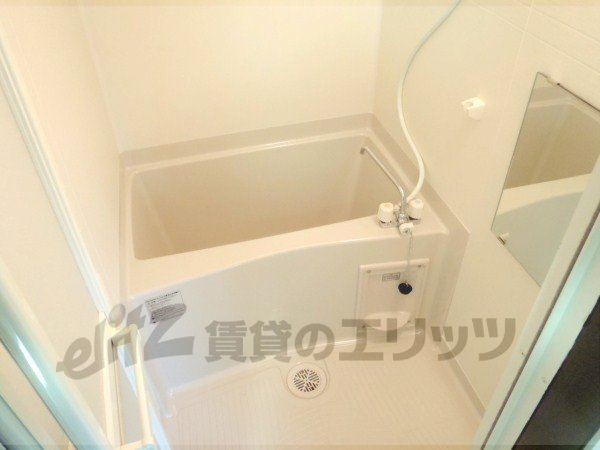 Bath. It is divided bath and toilet.