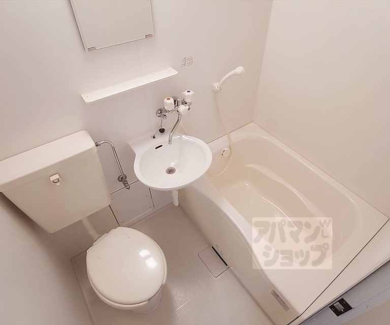 Toilet. 3-point unit is a bus.