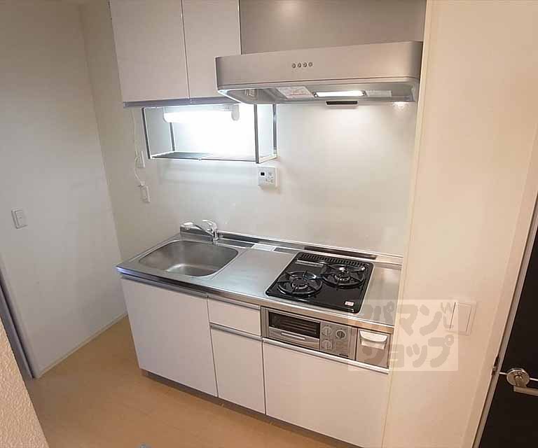 Kitchen. System kitchen and we are with two-burner gas stove.