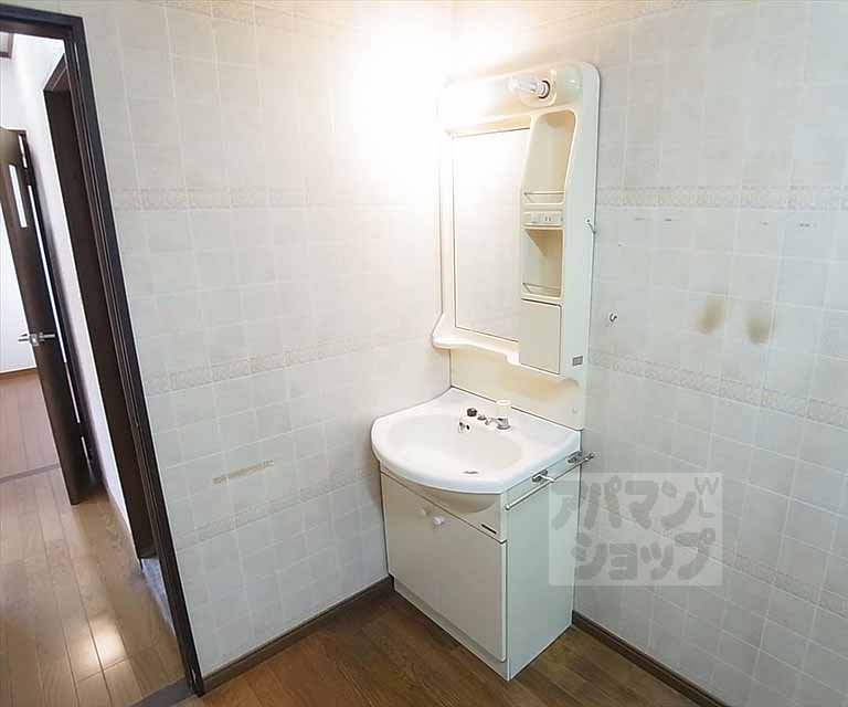 Washroom. It is equipped with independent wash basin or.