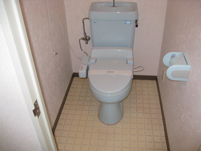 Toilet. Washlet is with