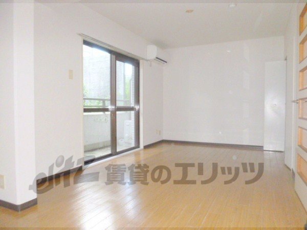 Living and room. The window is large, bright room.