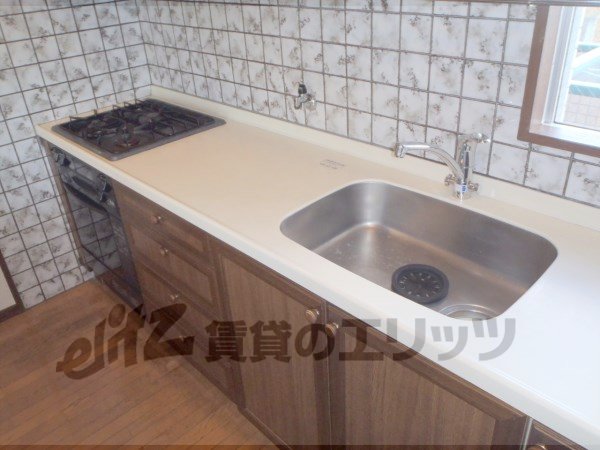 Kitchen. Also happily cooking dishes in the large kitchen