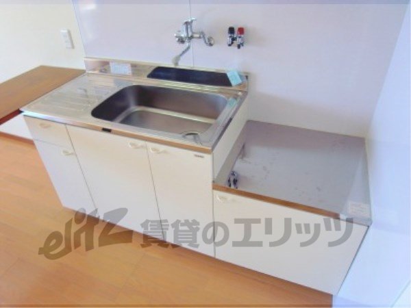 Kitchen. There is also a cutting board space.