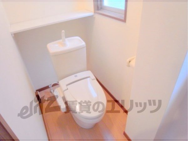 Toilet. Toilet is with a bidet.