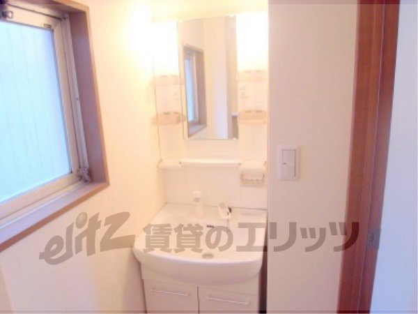 Washroom. I am happy that with shower.