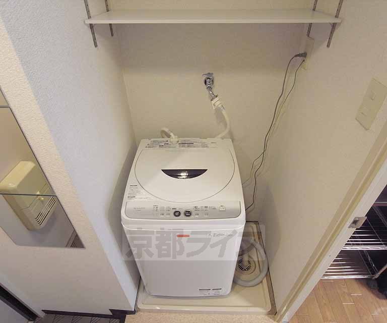 Entrance. This washing machine Storage.