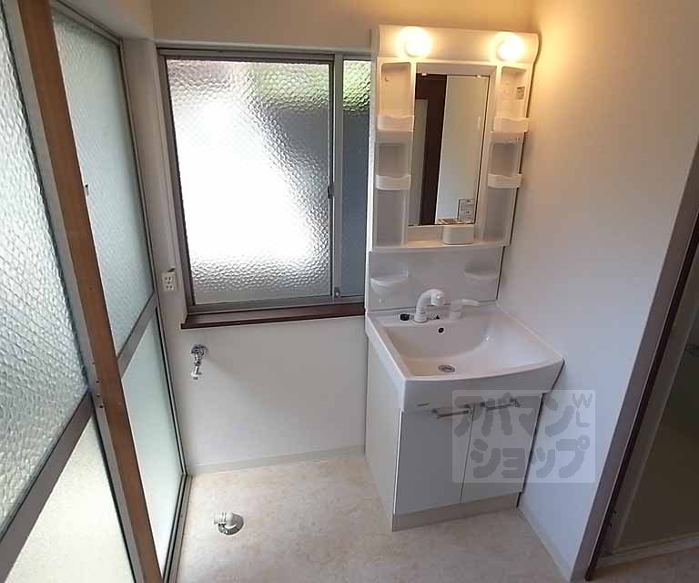 Washroom. Undressing space there is a separate wash basin and washing machine yard